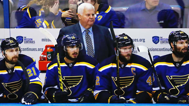 Ken-Hitchcock-Jamie-Squire.jpg